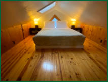 Loft w queen bed skylight